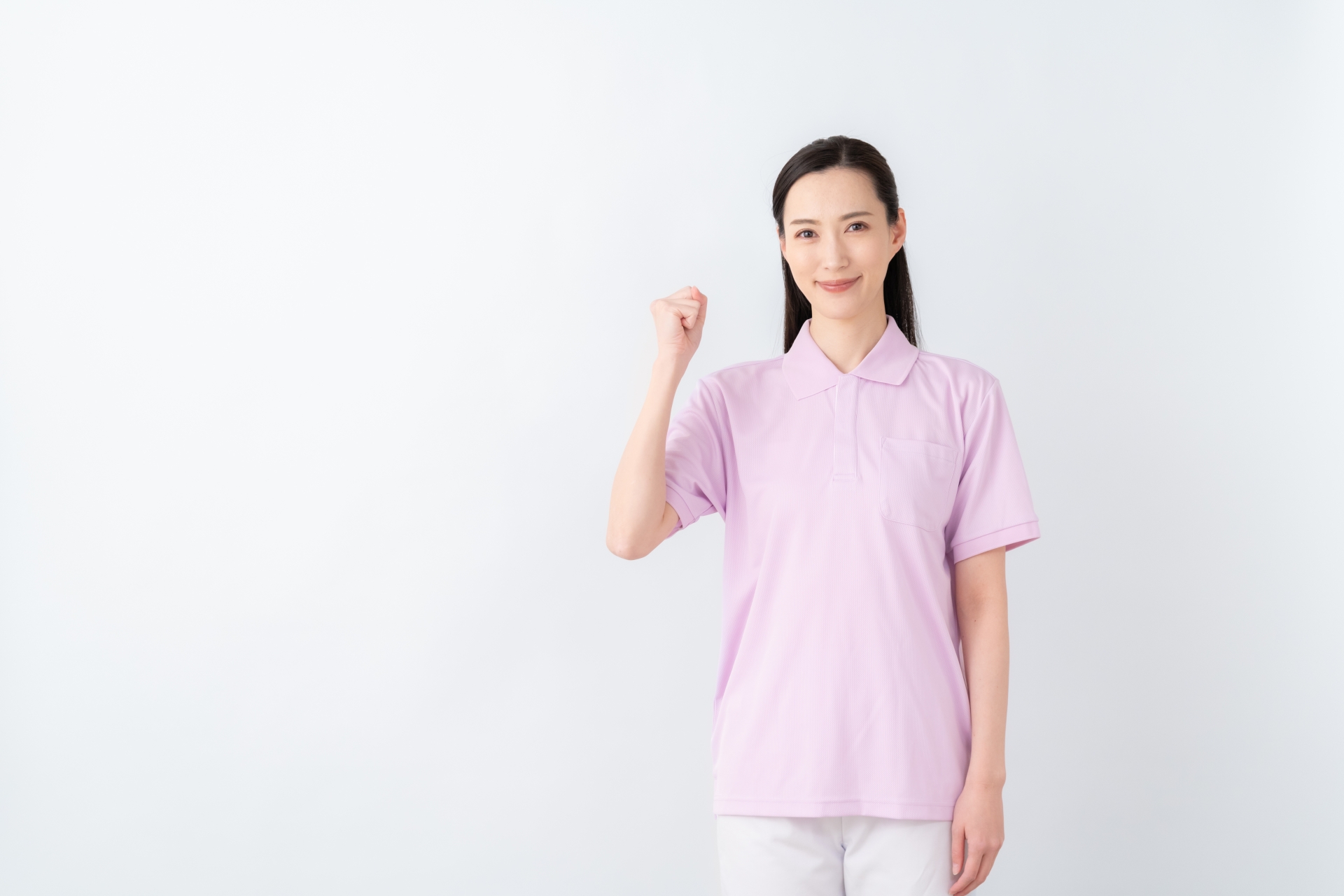ガッツポーズの女性