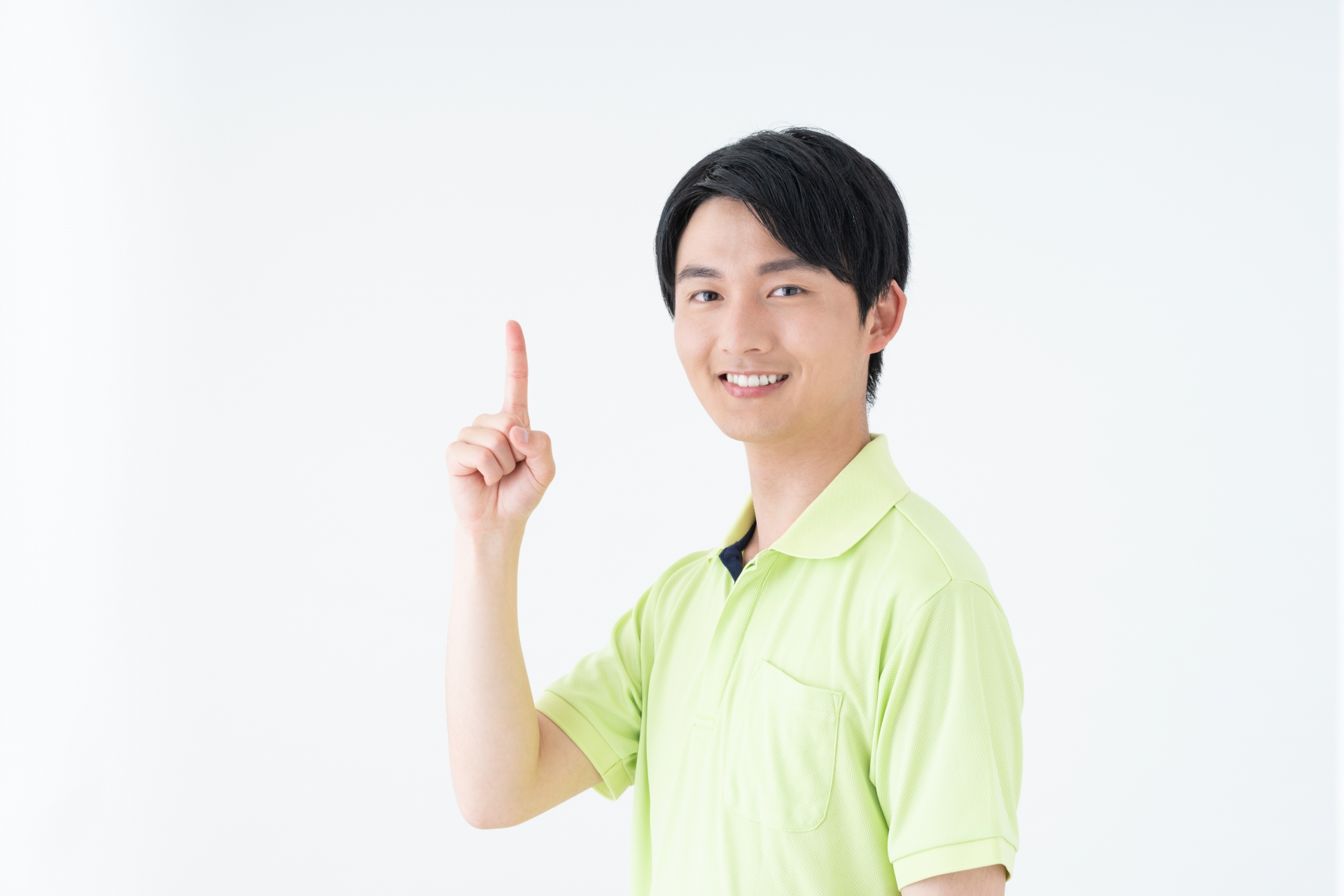 指さす男性