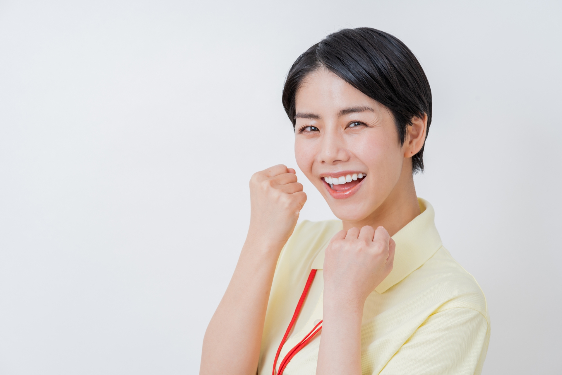 ガッツポーズの女性