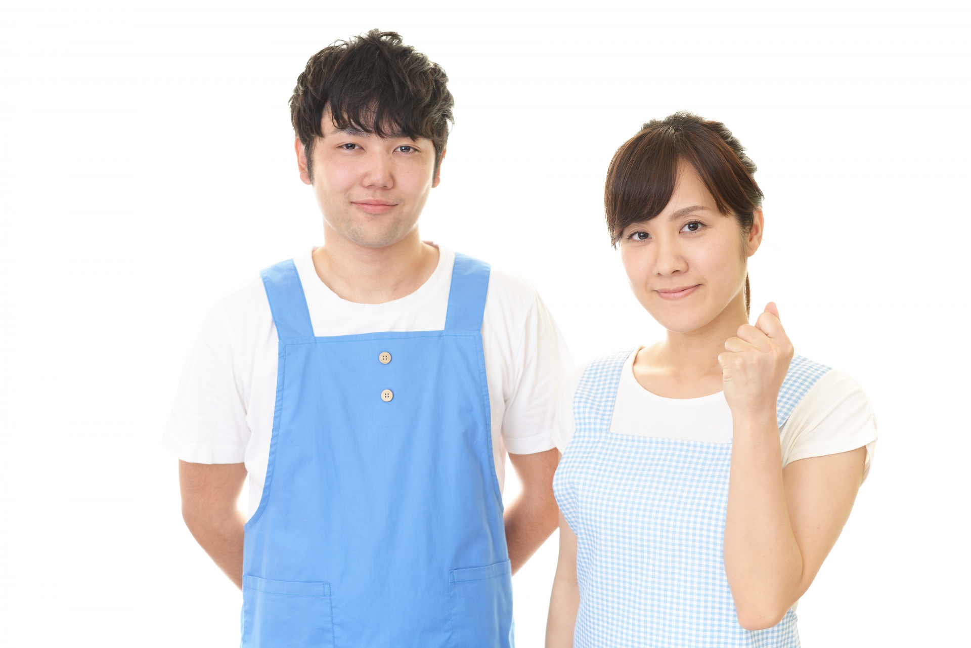 エプロンを着た男性と女性