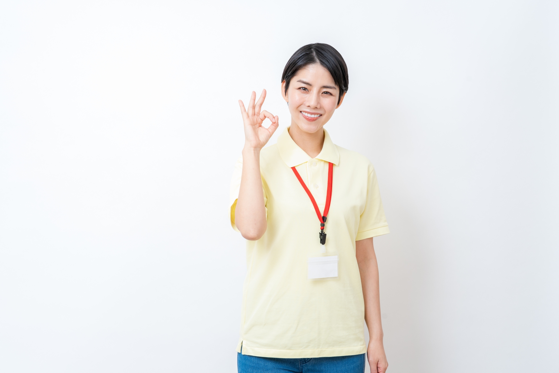 OKサインをする介護士の女性