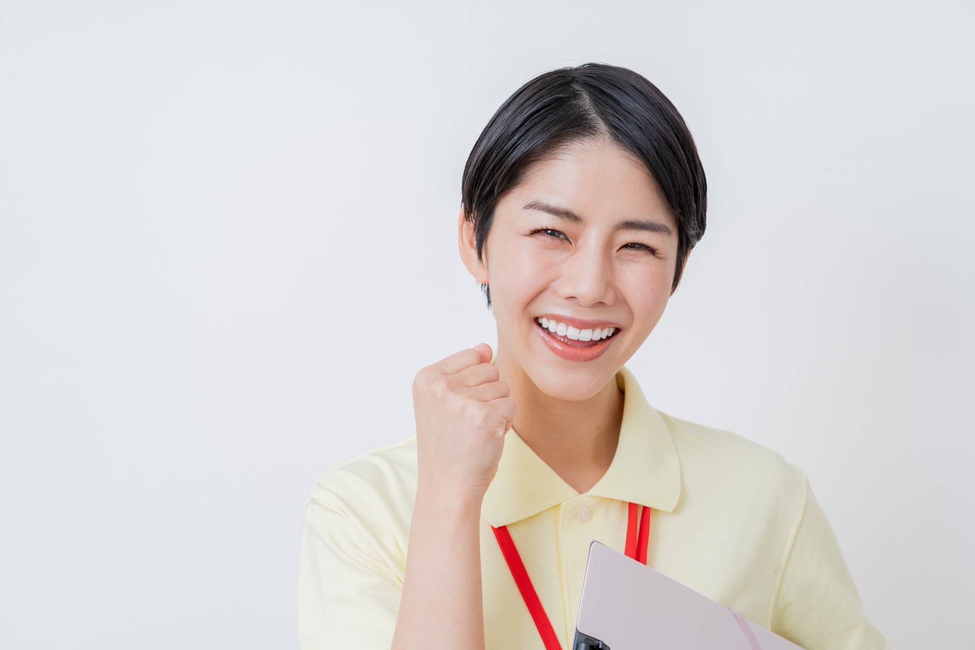 ガッツポーズの女性