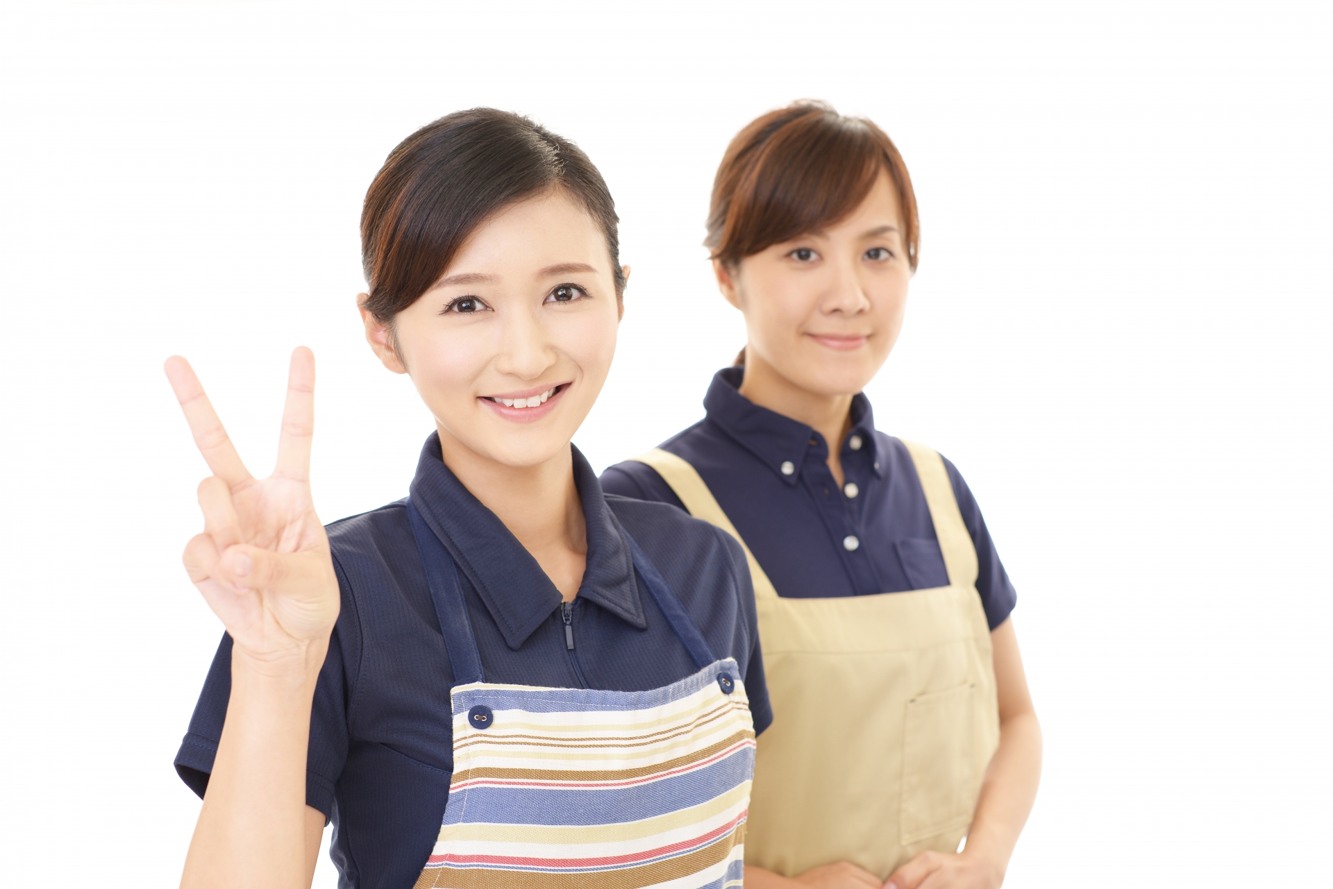 エプロンを着た二人の女性