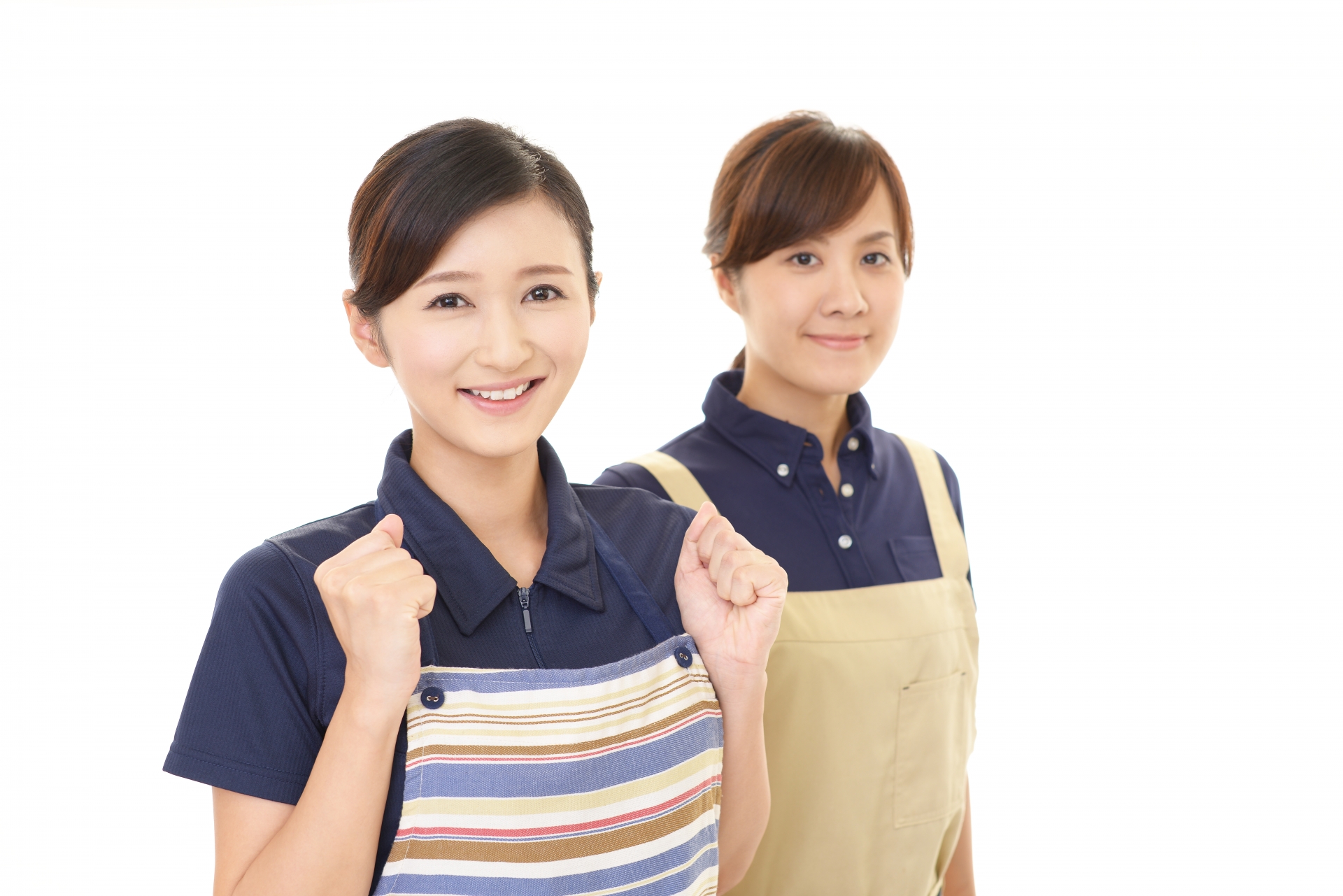 エプロンを着た二人の女性