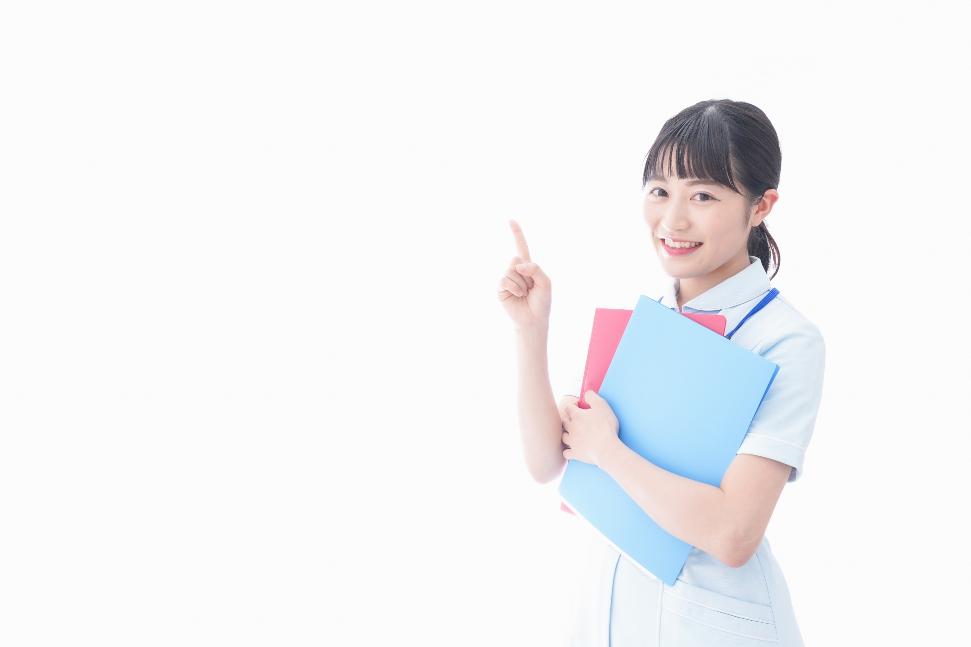 指をさす看護師