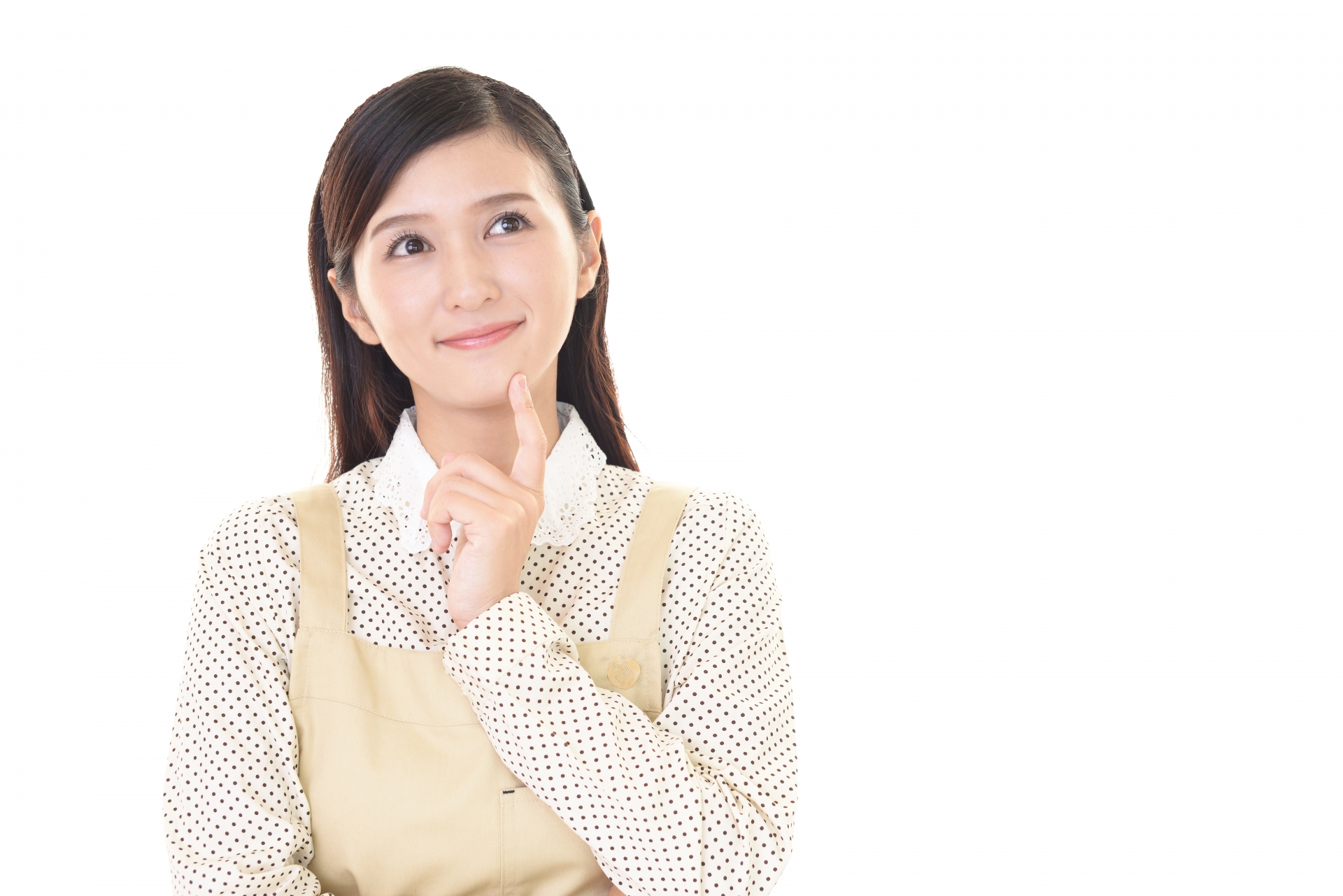 空想するエプロン姿の女性