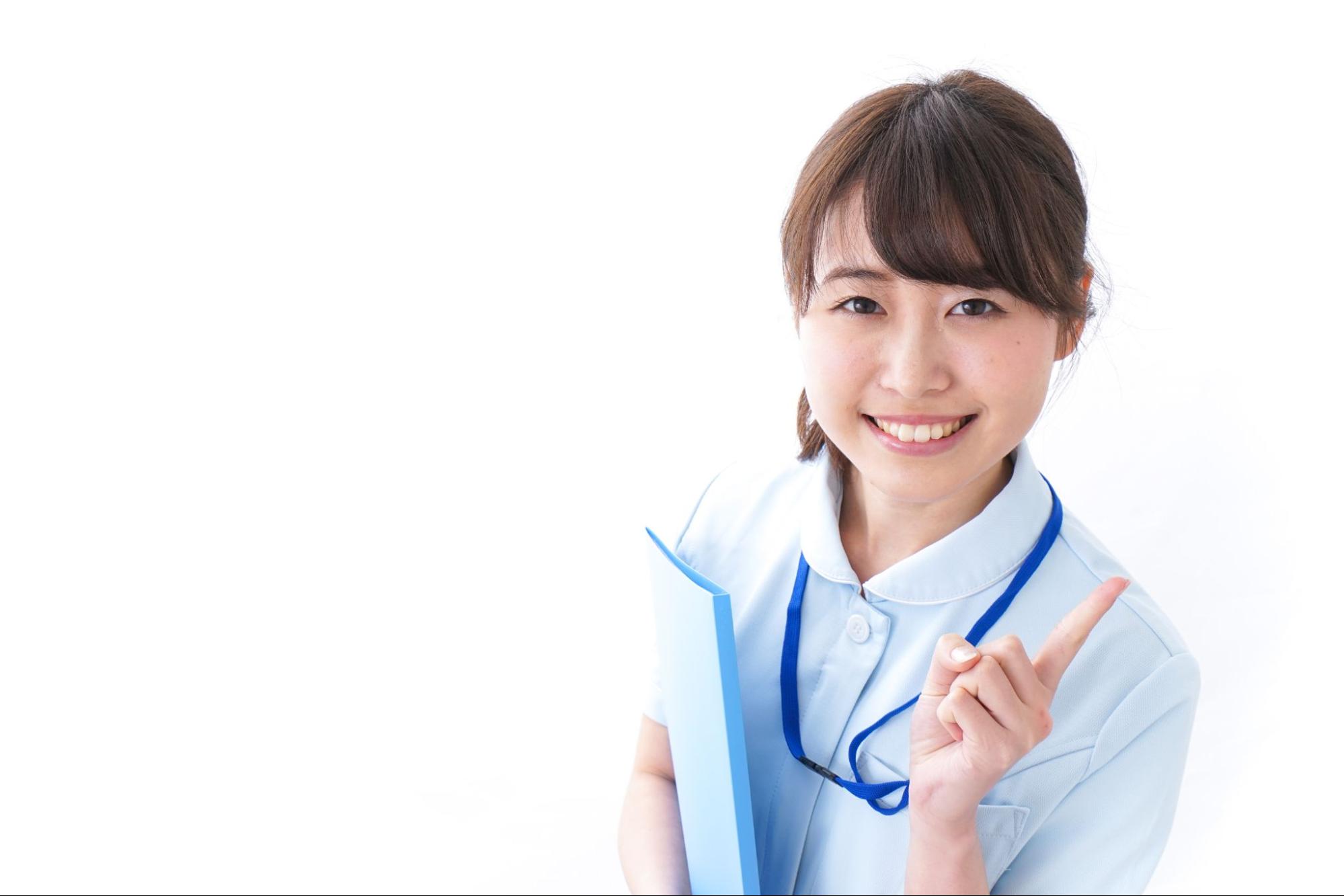 指さす女性