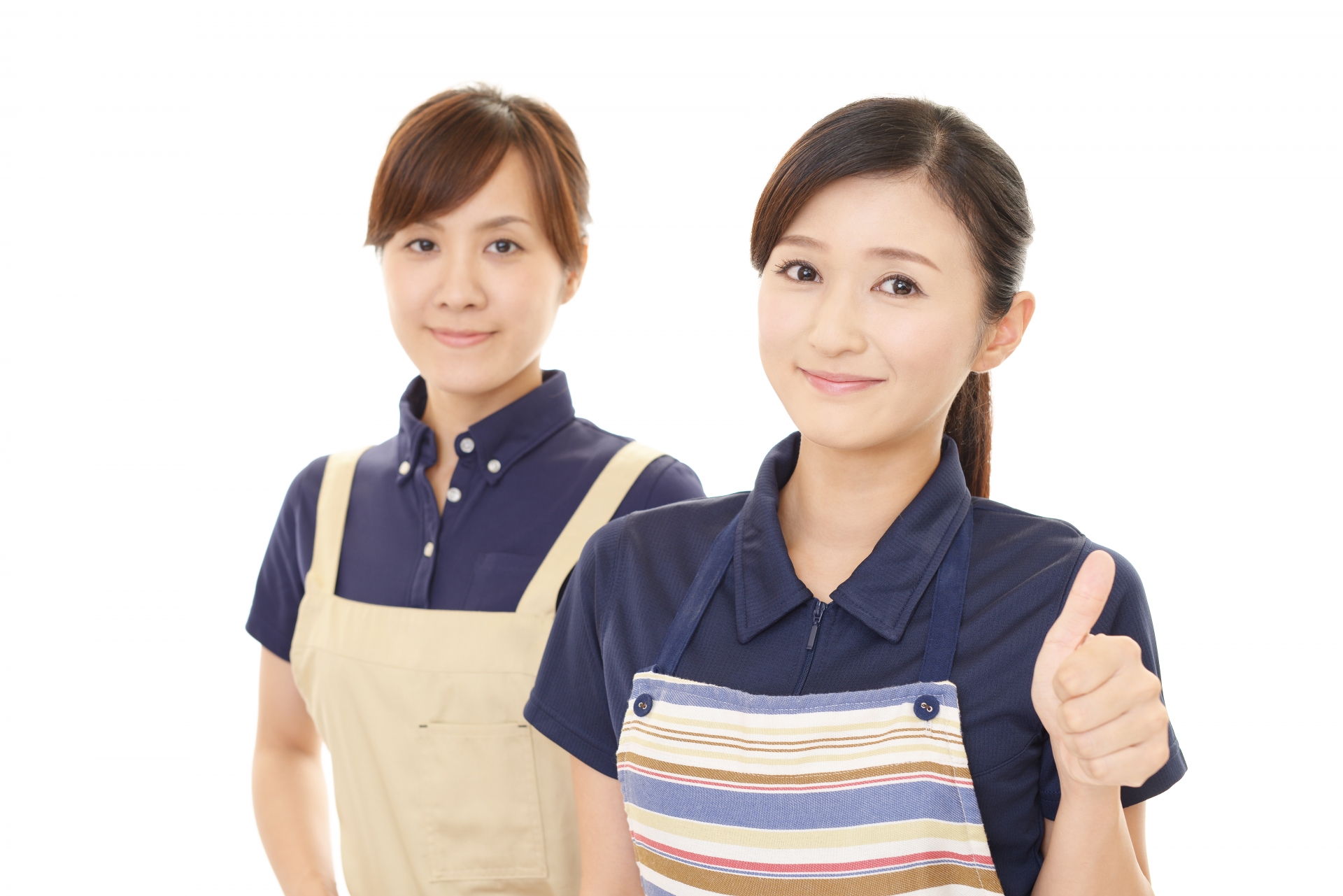 エプロンを着た二人の女性