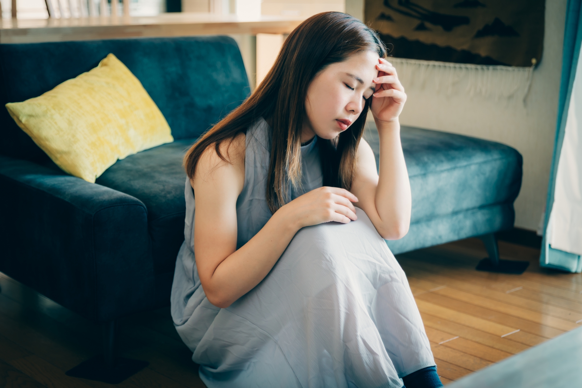 具合悪そうな女性