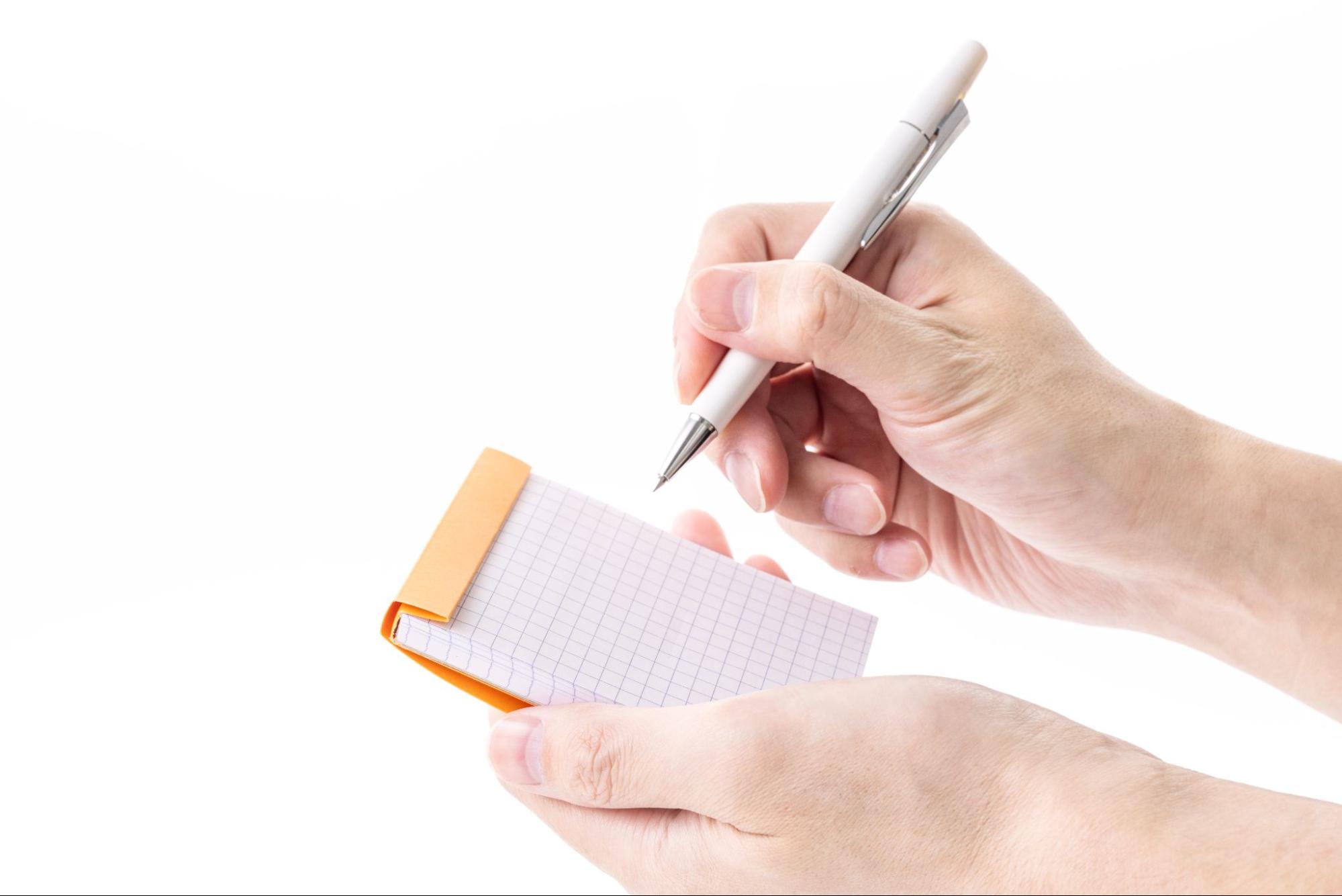 ペンとメモ帳記入イメージ