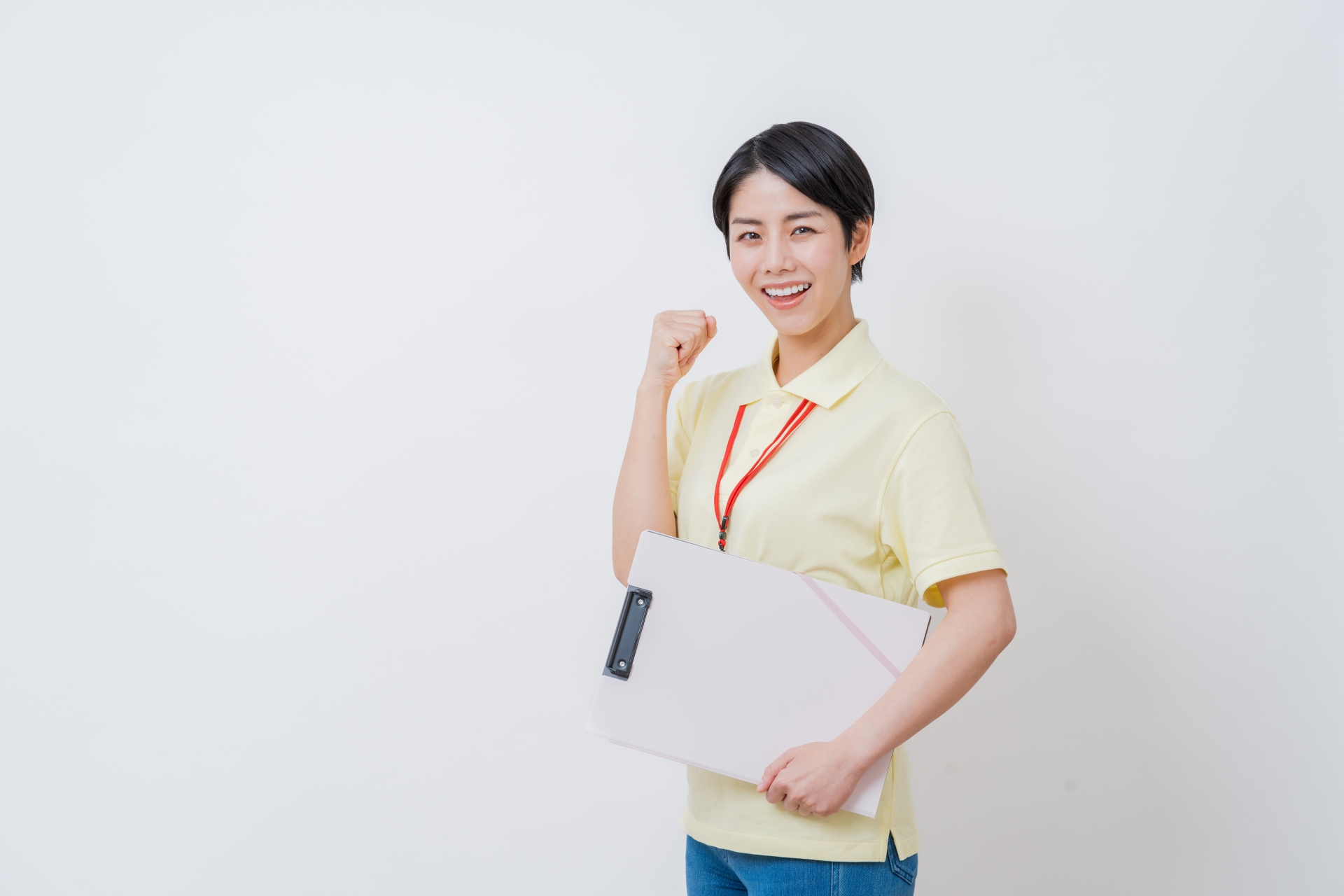 横向きのガッツポーズをする女性