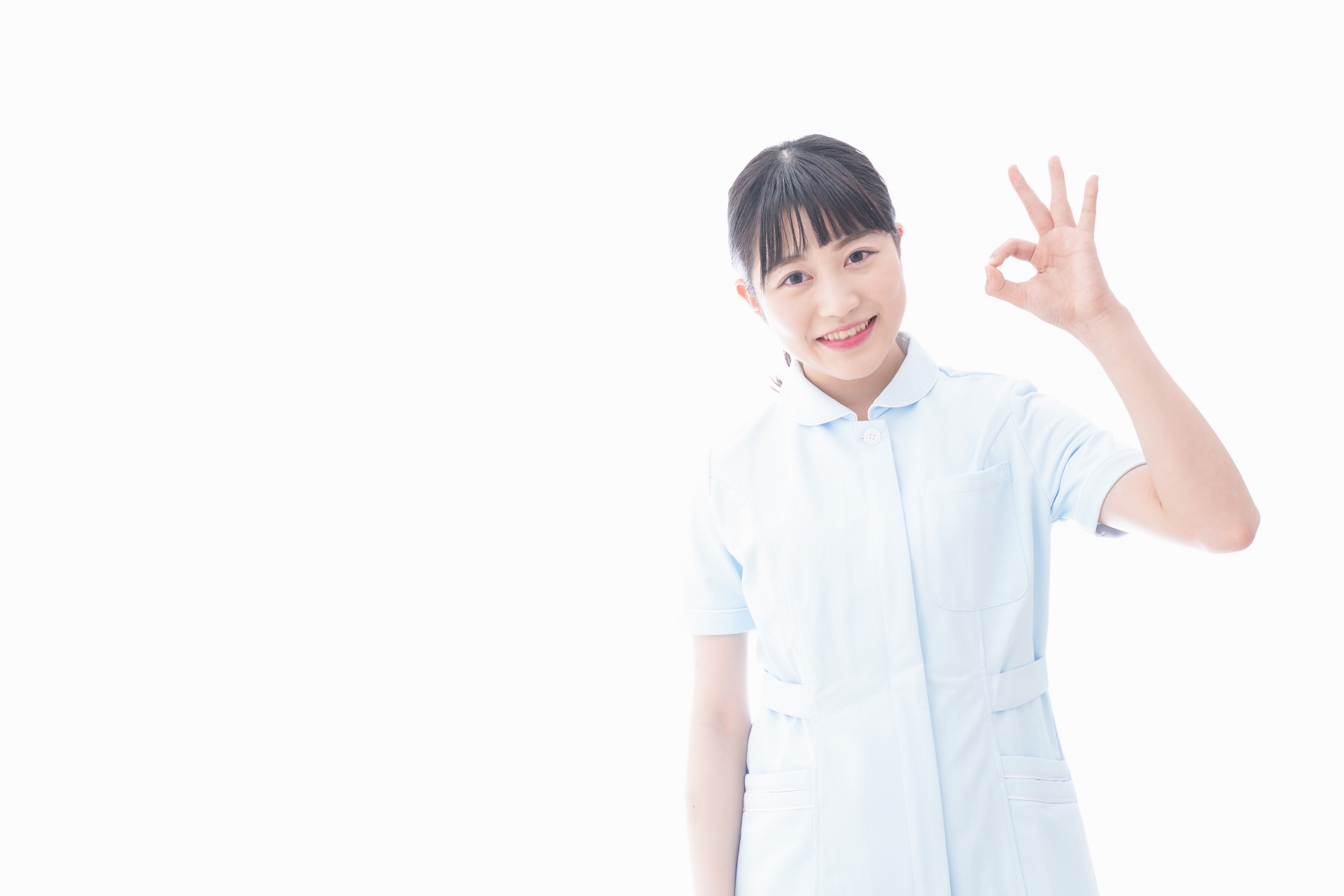 OKサインをする看護師