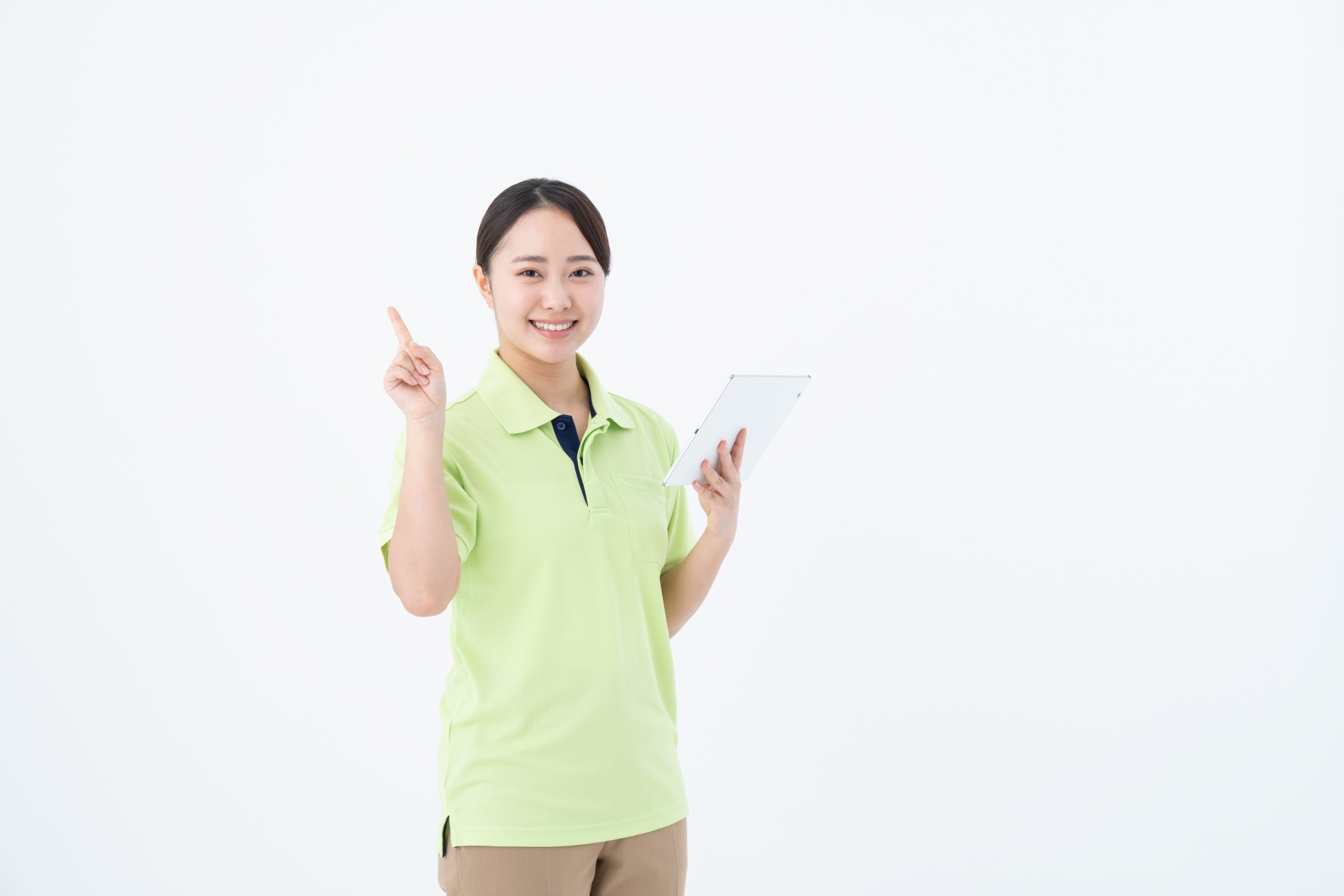 指を立てる介護士の女性