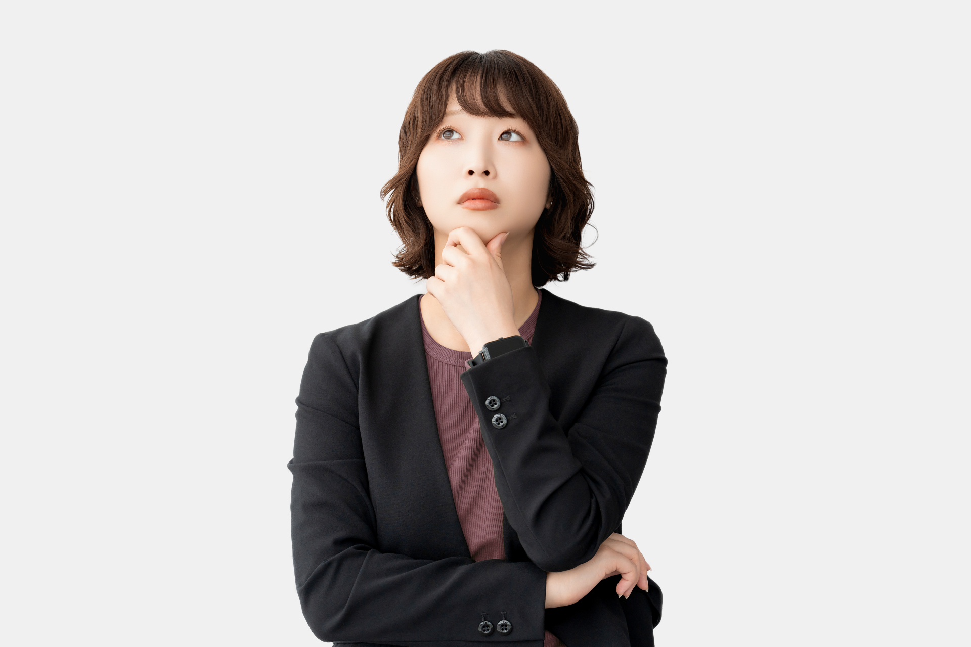 考えごとをする女性・ビジネスウーマン