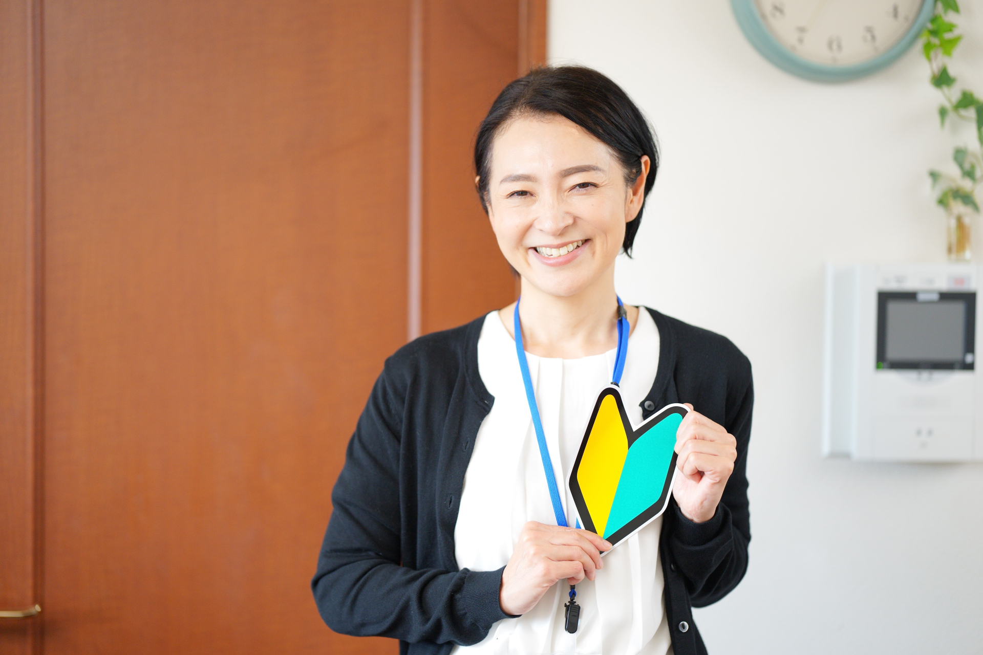 初心者マークを持っているケアマネジャー