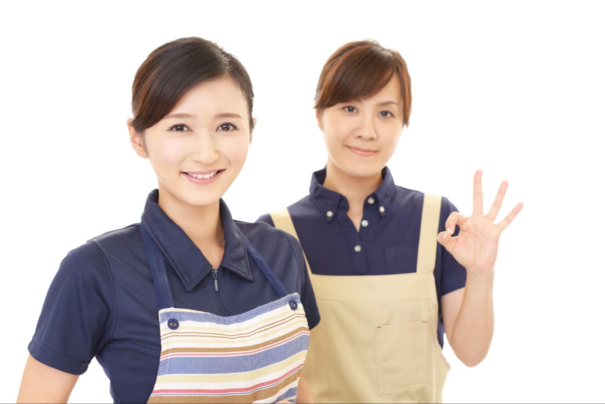 エプロンを着た二人の女性