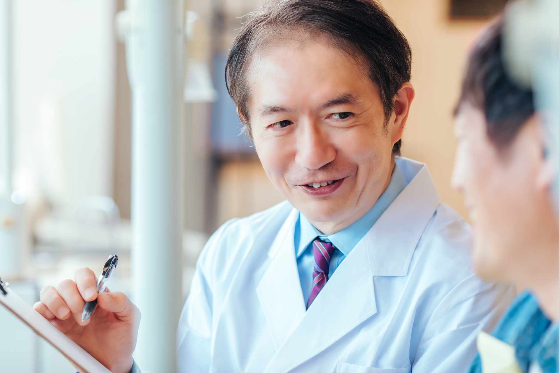 男性医師と患者