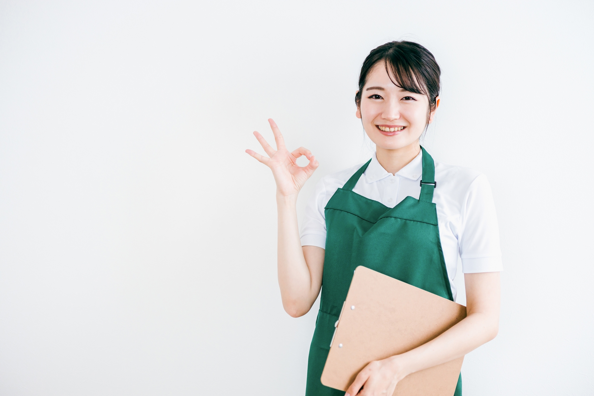 エプロン姿の女性(スーパーマーケット)